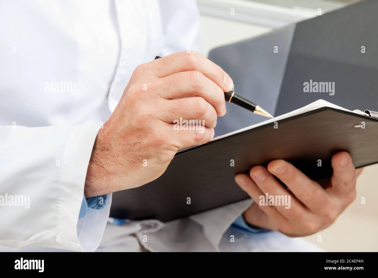 Hygiene inspector when working with clipboard Stock Photo