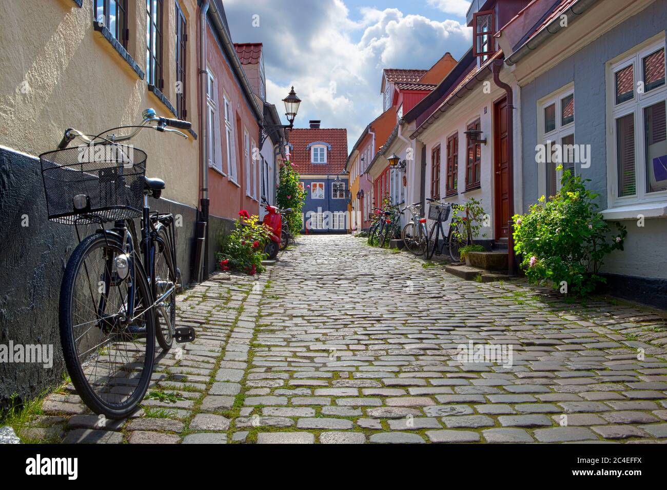 Cobblestone alley near Vor Frue Kirke in the old town, Aalborg, Jutland, Denmark, Europe Stock Photo