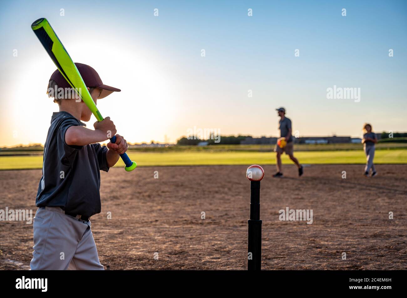 Tee ball sport played by youth groups in the summer Stock Photo Alamy