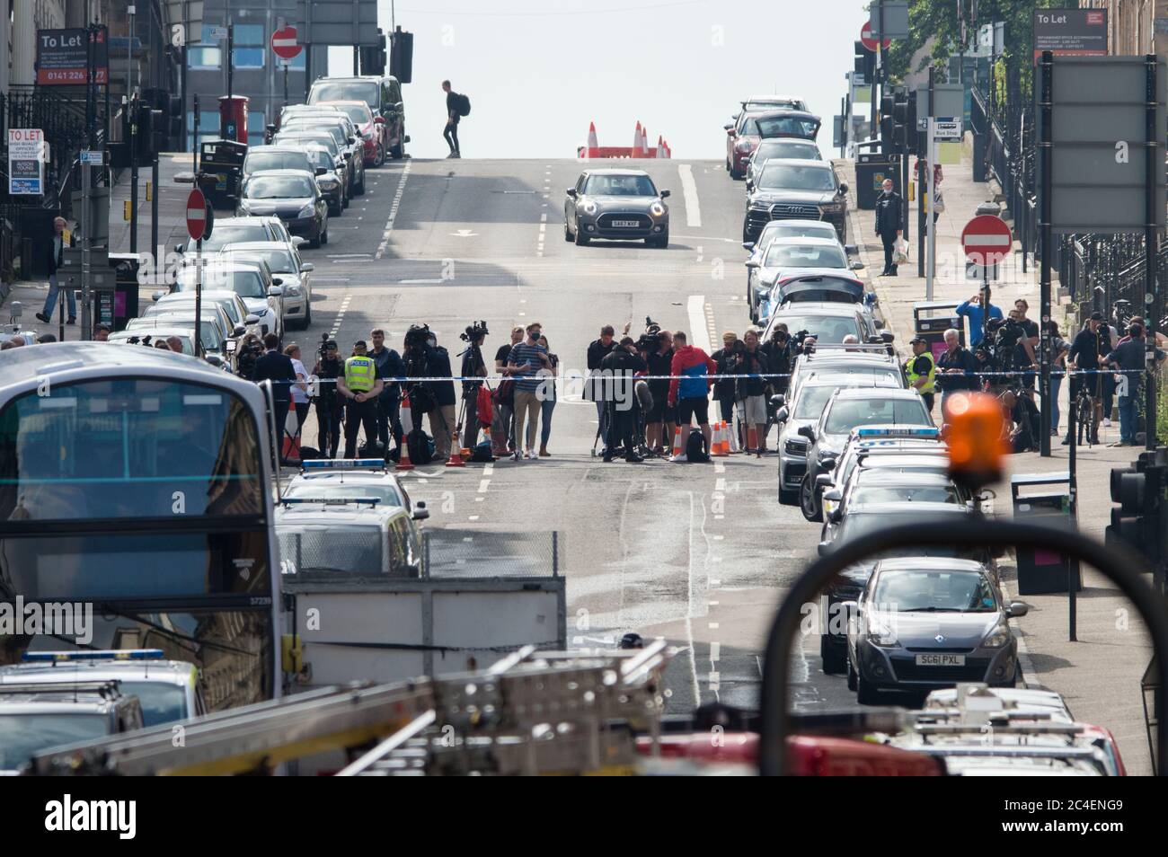 Glasgow, Scotland, UK. 26th June, 2020. Pictured: A major police incident has been declared in Glasgow as 6 people have been stabbed including a police officer and police shooting dead the attacker at a major incident at the Park Inn in West George Street which is hosting asylum seekers. Credit: Colin Fisher/Alamy Live News Stock Photo