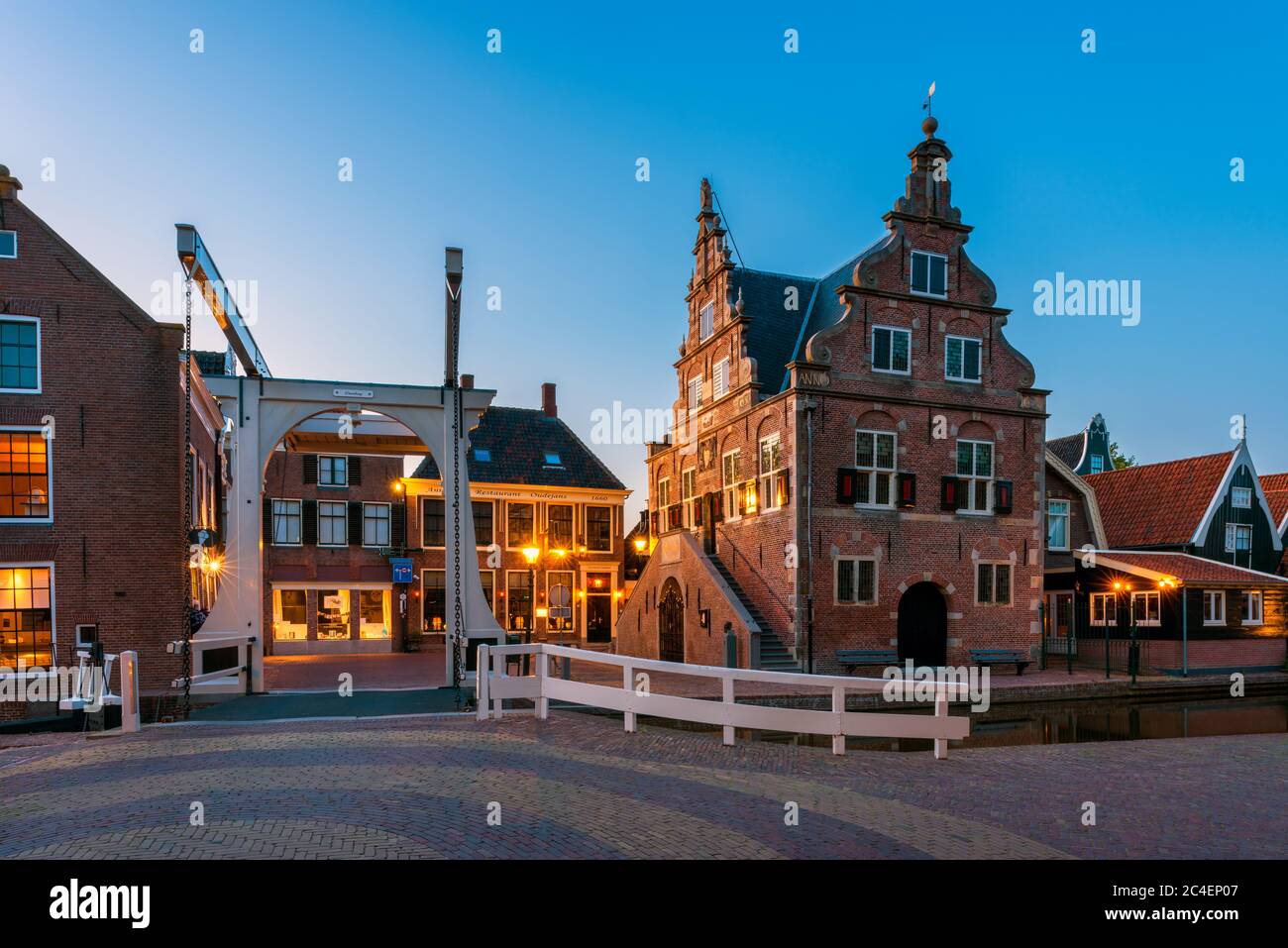 Town Hall in De Rijp Netherlands at Dusk. It was built in 1630 and is now in use as a tourist office and wedding venue. Stock Photo