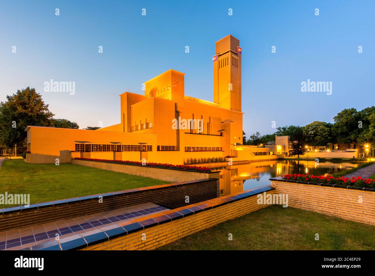 Town Hall of Hilversum Netherlands at Dusk, It was built in 1931 by Willem Dudok. Stock Photo