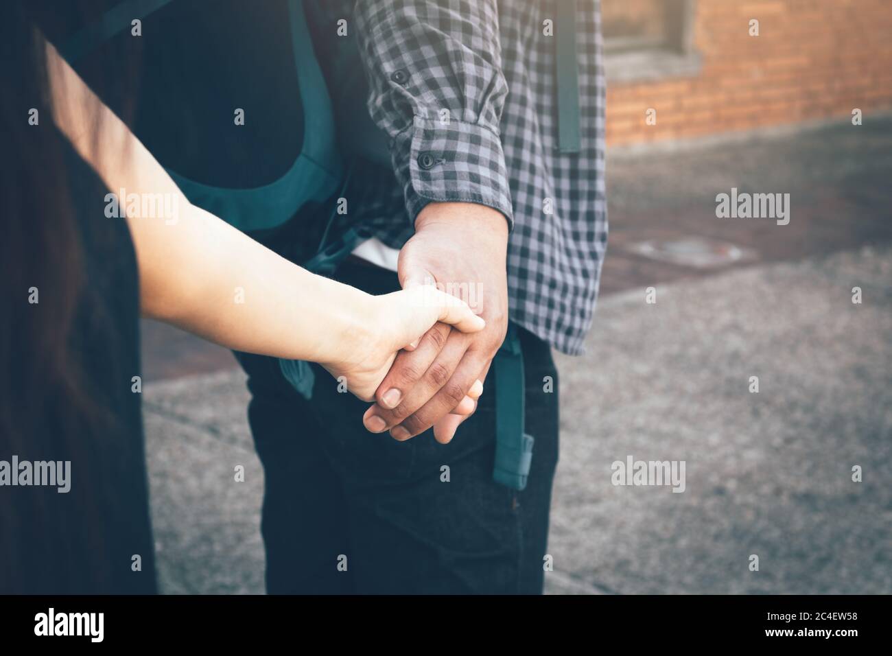 Teen couple walking holding hands hi-res stock photography and images ...