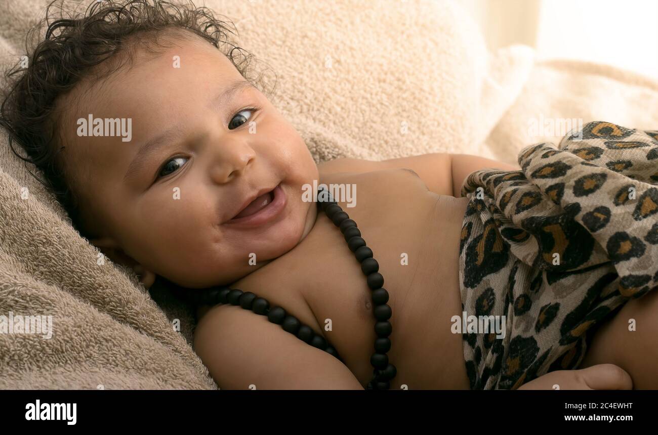 Portrait of a mixed race happy baby boy Stock Photo - Alamy