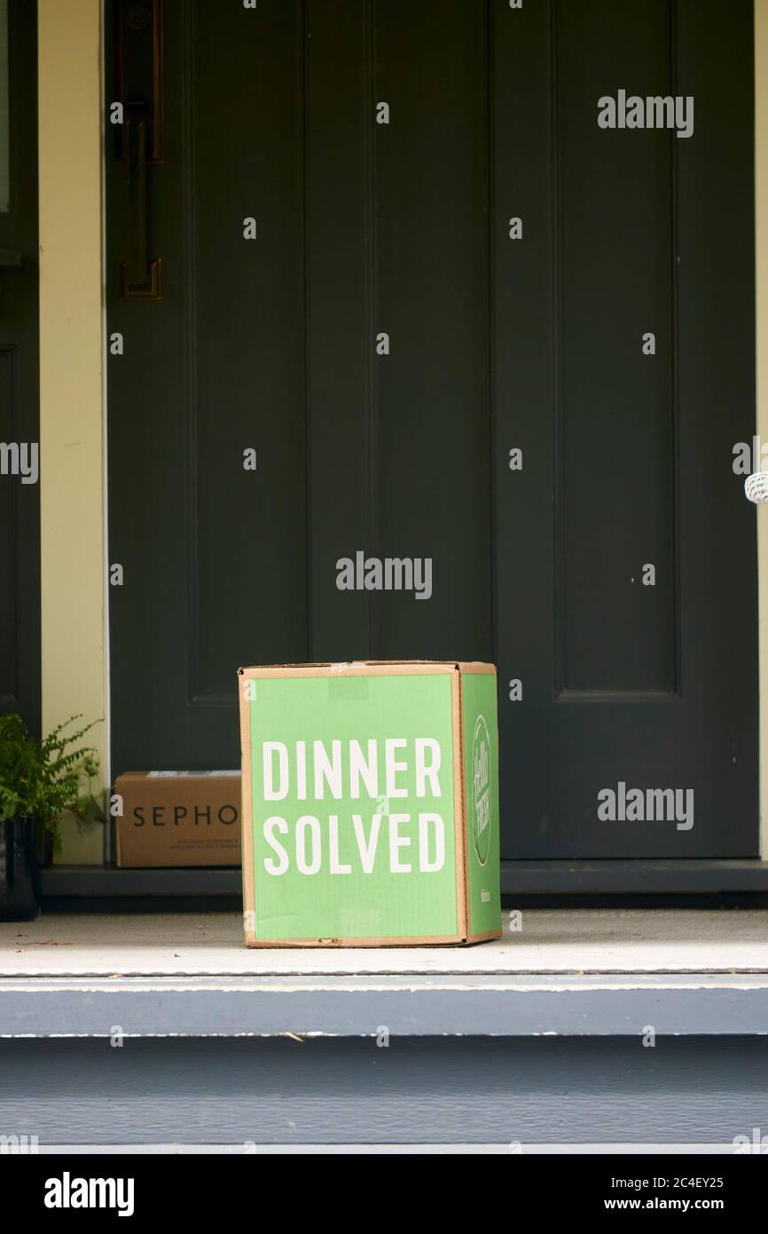 Dinner Solved meal kit box sitting on the front porch of a house, Vancouver, BC, Canada Stock Photo