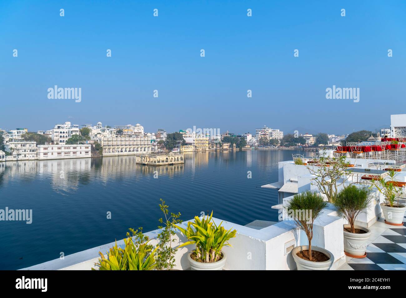 View over the old city and Lake Pichola from the Jagat Niwas Palace Hotel in the early morning, Udaipur, Rajasthan, India Stock Photo