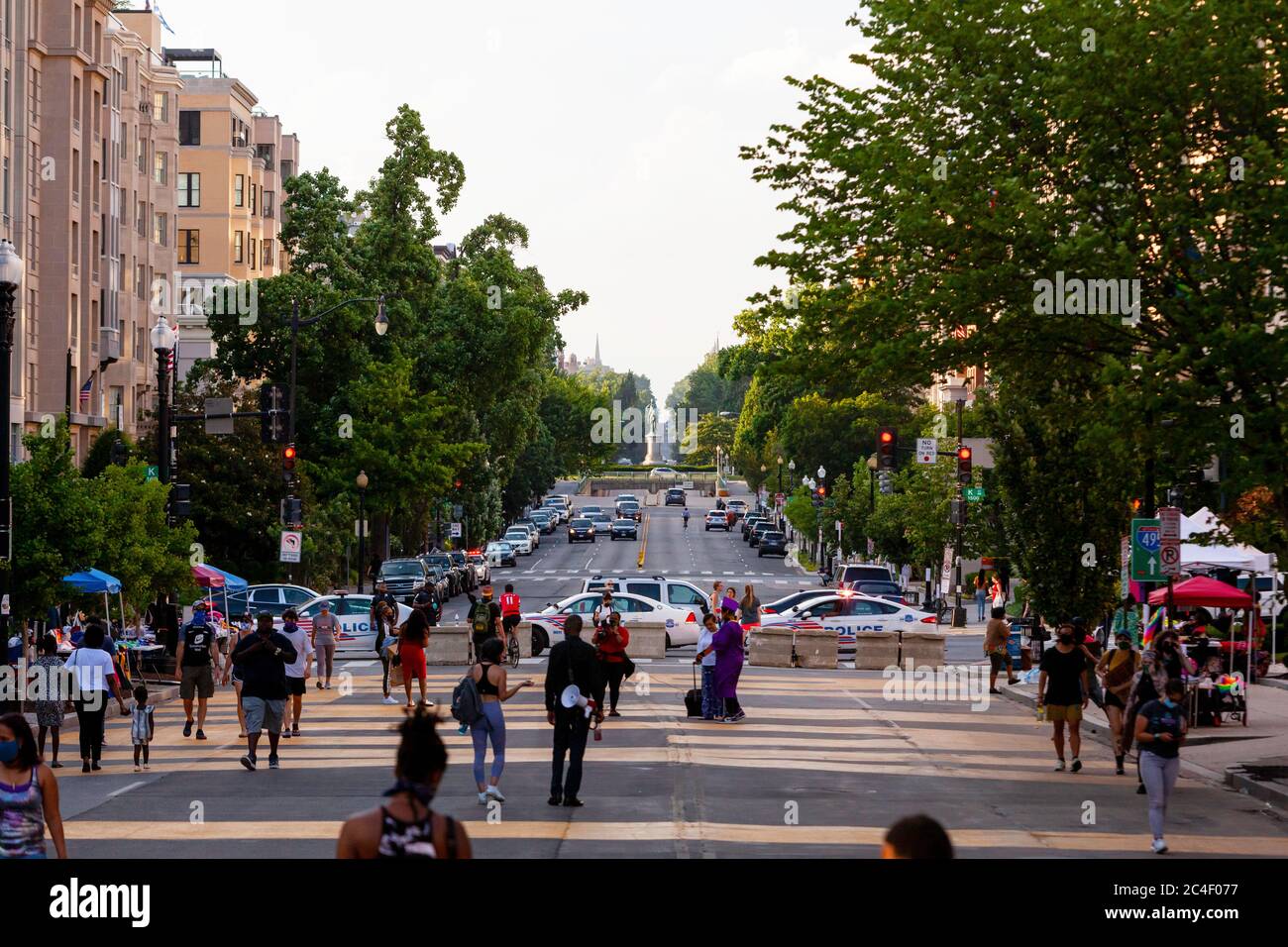 View of Scott Circle and protesters at Black Lives Matter Plaza on a summer evening, Washington, DC, United States Stock Photo