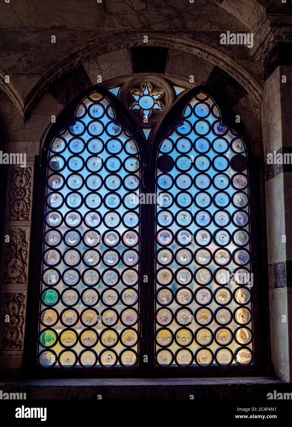 Rondel leaded glass window inside the church of Santa Maria della Spina ...