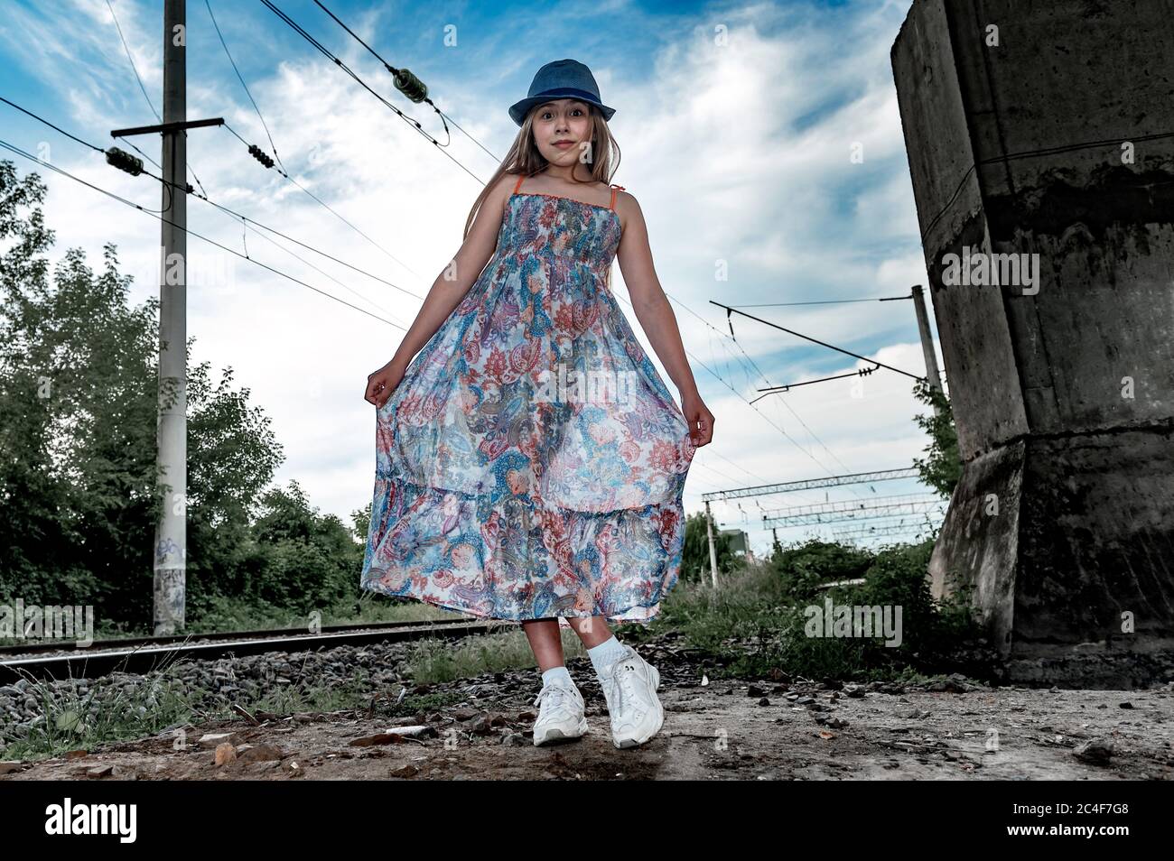 Woman walks alone back to the lens hi-res stock photography and images ...