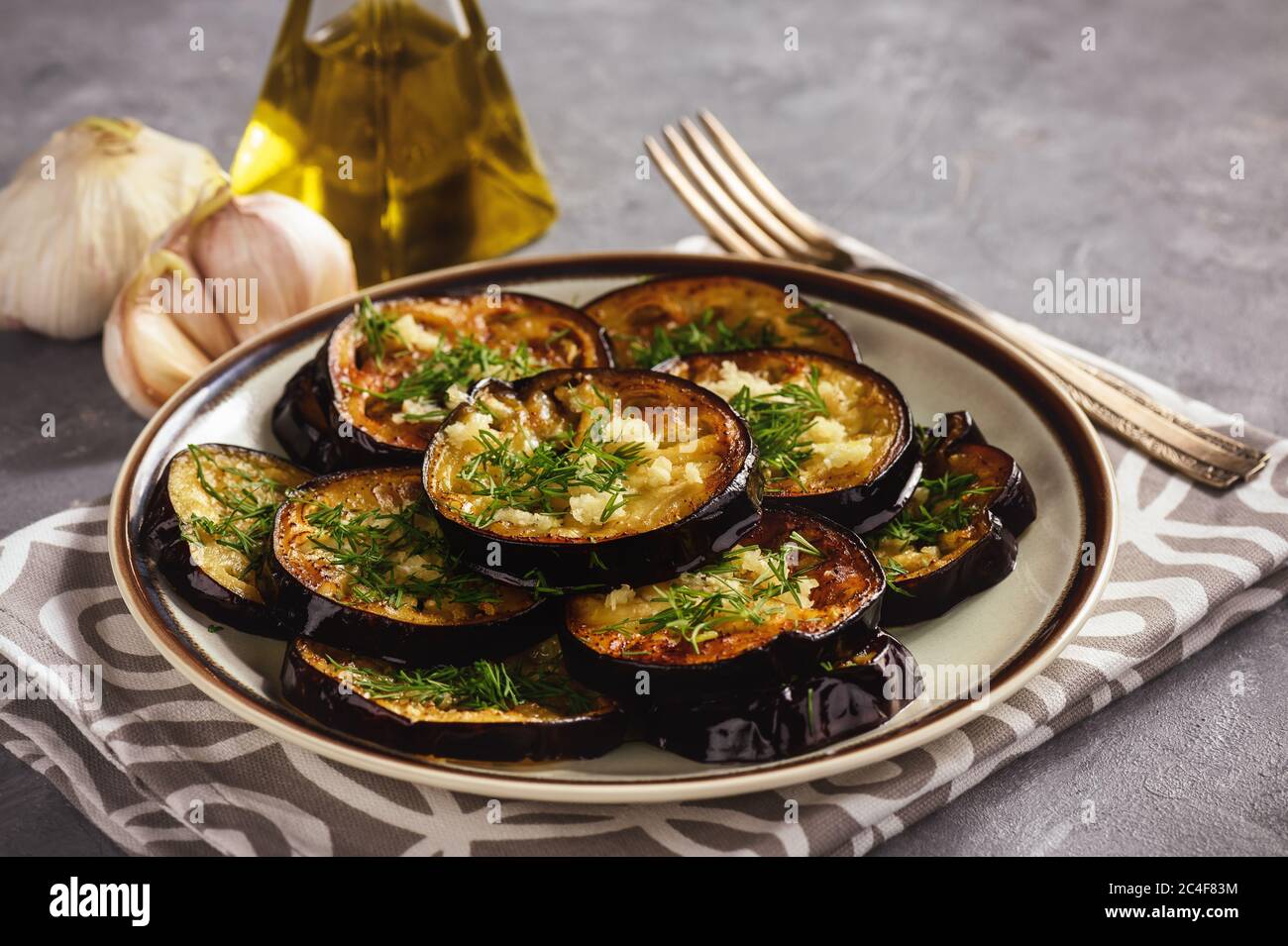 Fried eggplants with garlic and dill Stock Photo Alamy