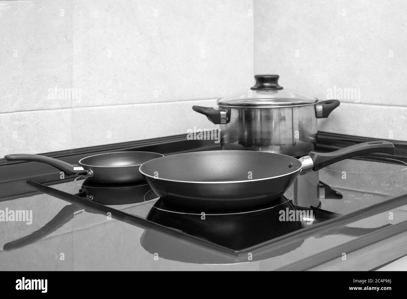 Pan on modern electric stove in the kitchen Stock Photo Alamy