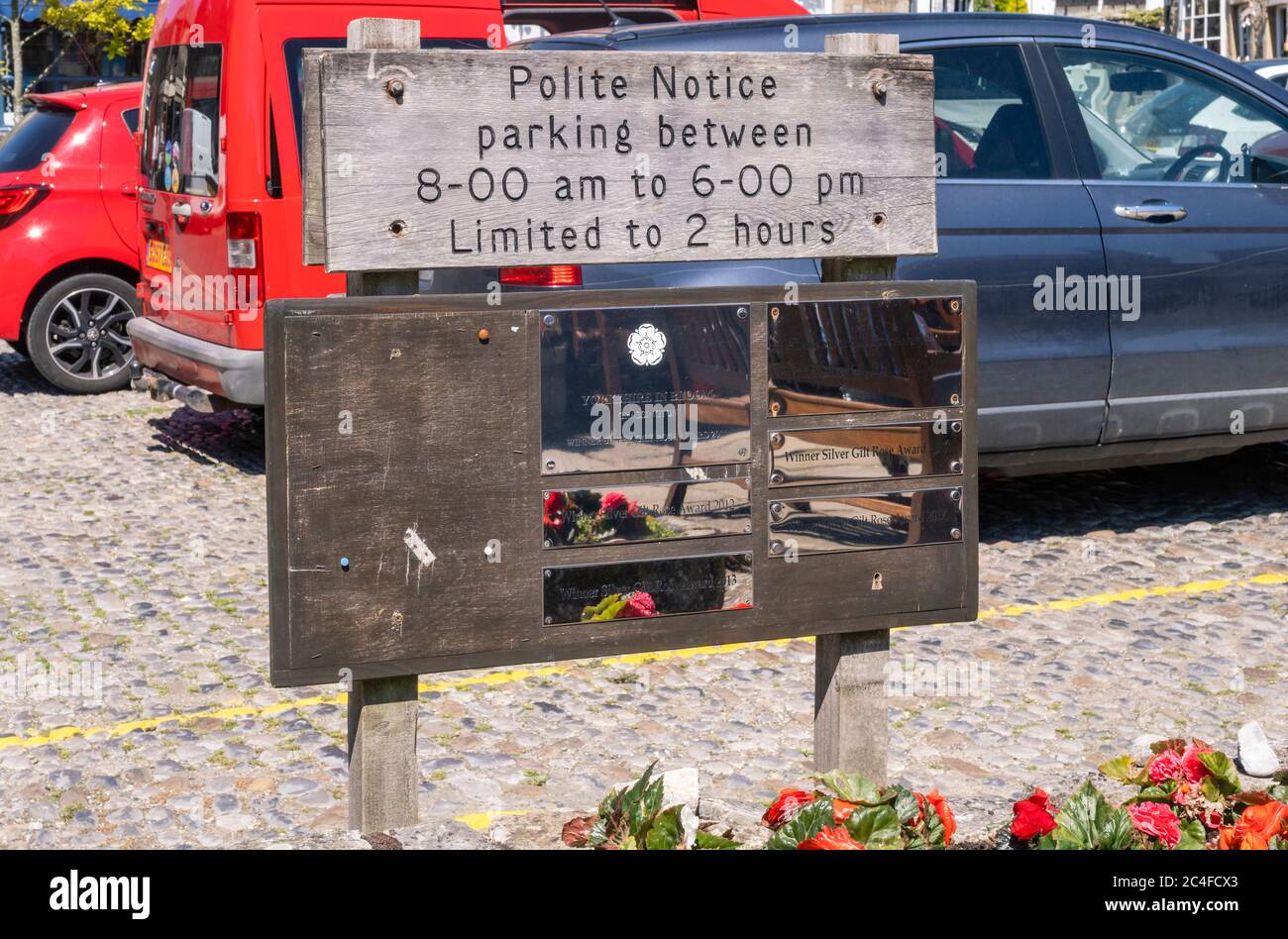25.06.2020 Grassington, North Yorkshire, UK Car parking notice in the centre of Grassington in North Yorkshire Stock Photo