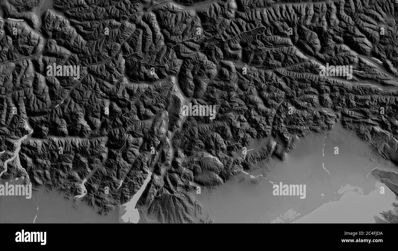 Trentino-Alto Adige, autonomous region of Italy. Grayscaled map with lakes and rivers. Shape outlined against its country area. 3D rendering Stock Photo