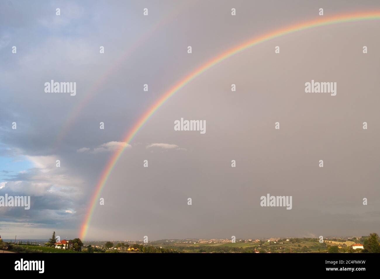 Blue sky with clouds on horizon and rainbow background hi-res stock ...