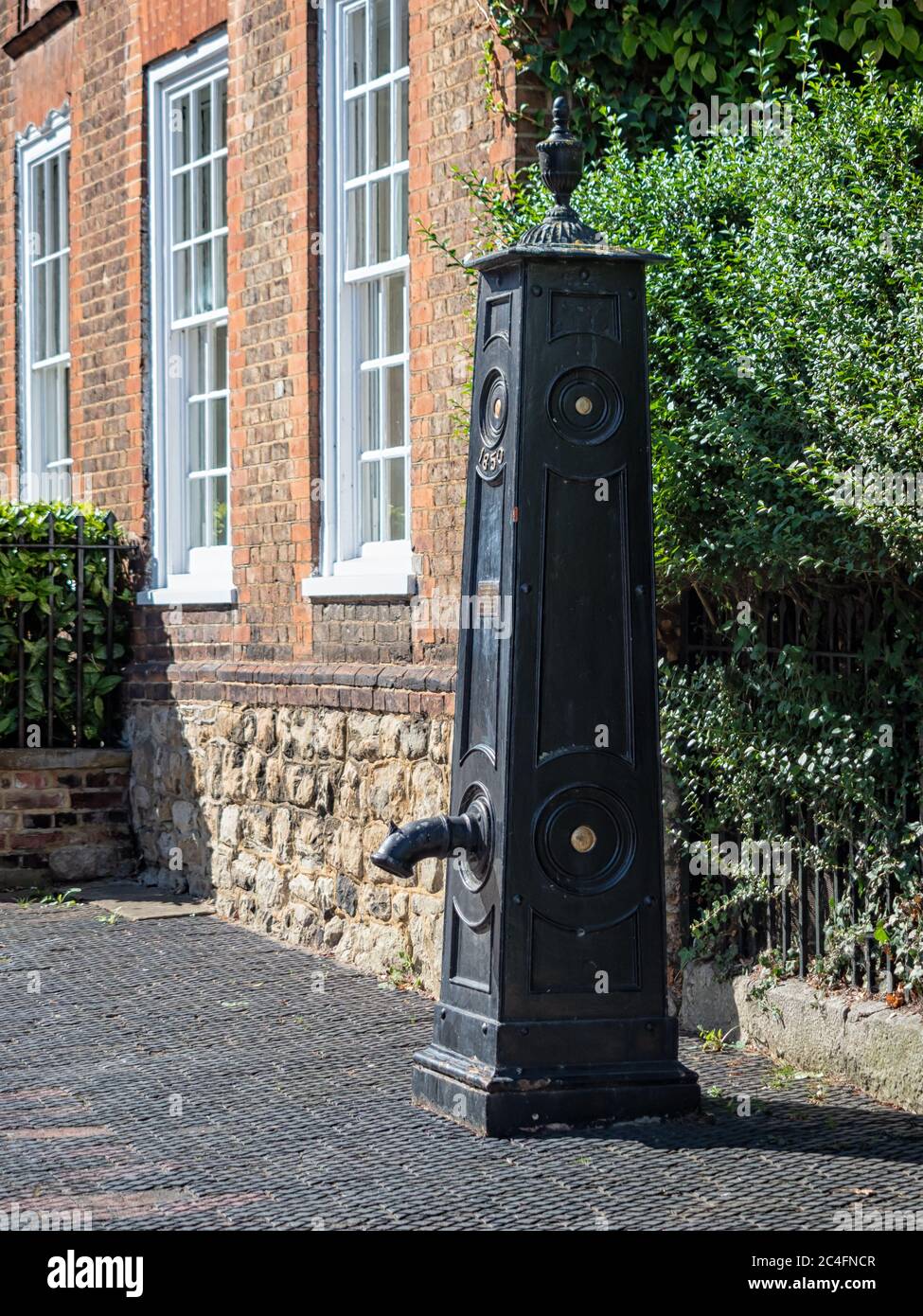 WEST MALLING, KENT, UK - SEPTEMBER 13, 2019:  Victorian Water Pump in the High Street Stock Photo