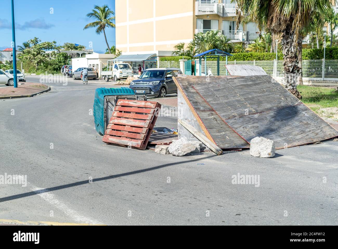 Protesters use debris to block the main road on french Saint Martin. The Main protest is against the natural risk prevention plan (PPRN) decision to n Stock Photo