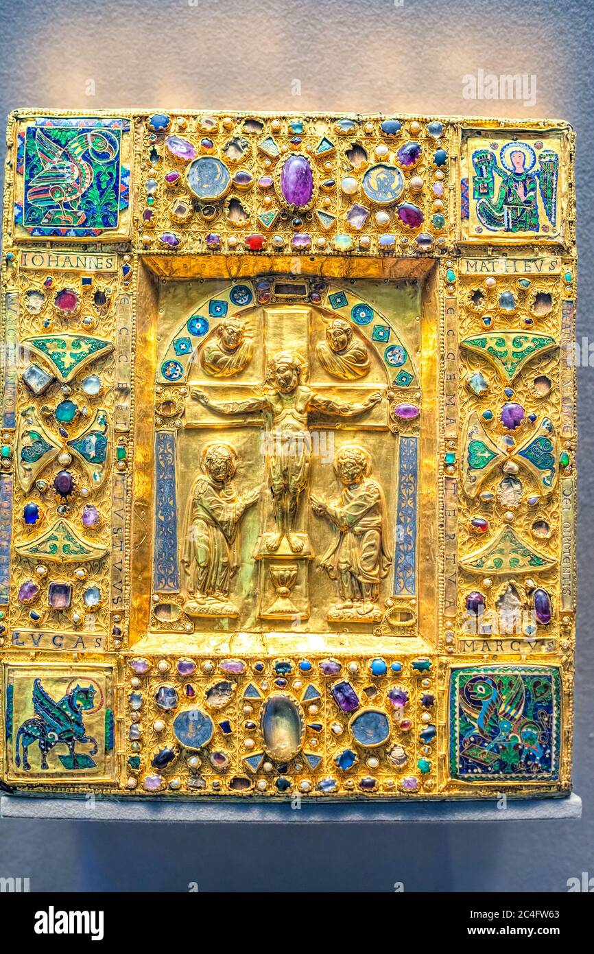 Ancient golden Bible cover in the Louvre Museum Paris France Stock Photo