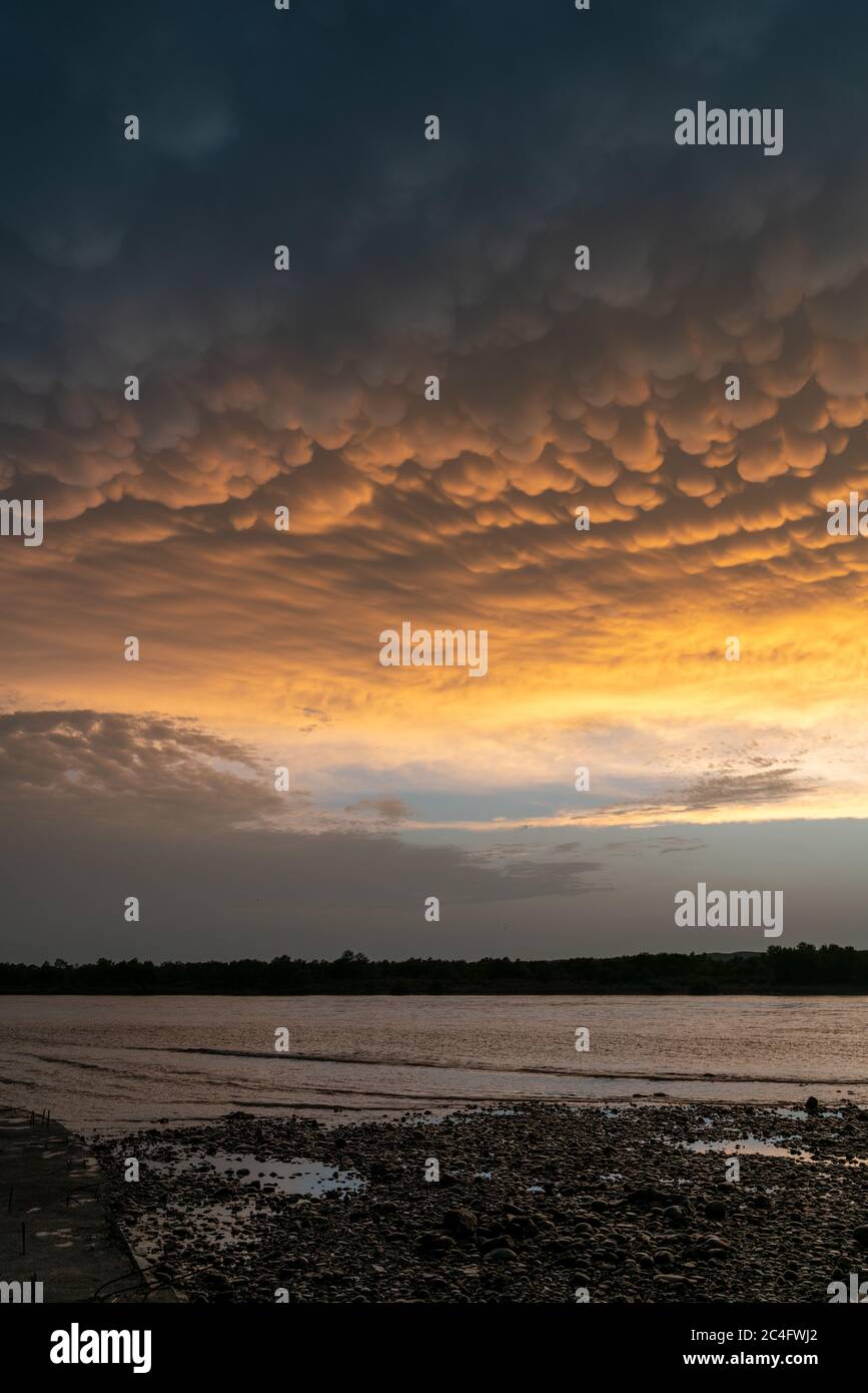 Rare view of Mammatus clouds during sunset Stock Photo - Alamy