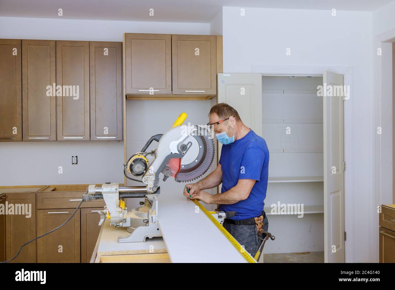 Worker protects himself from covid19, man cut using circular saw