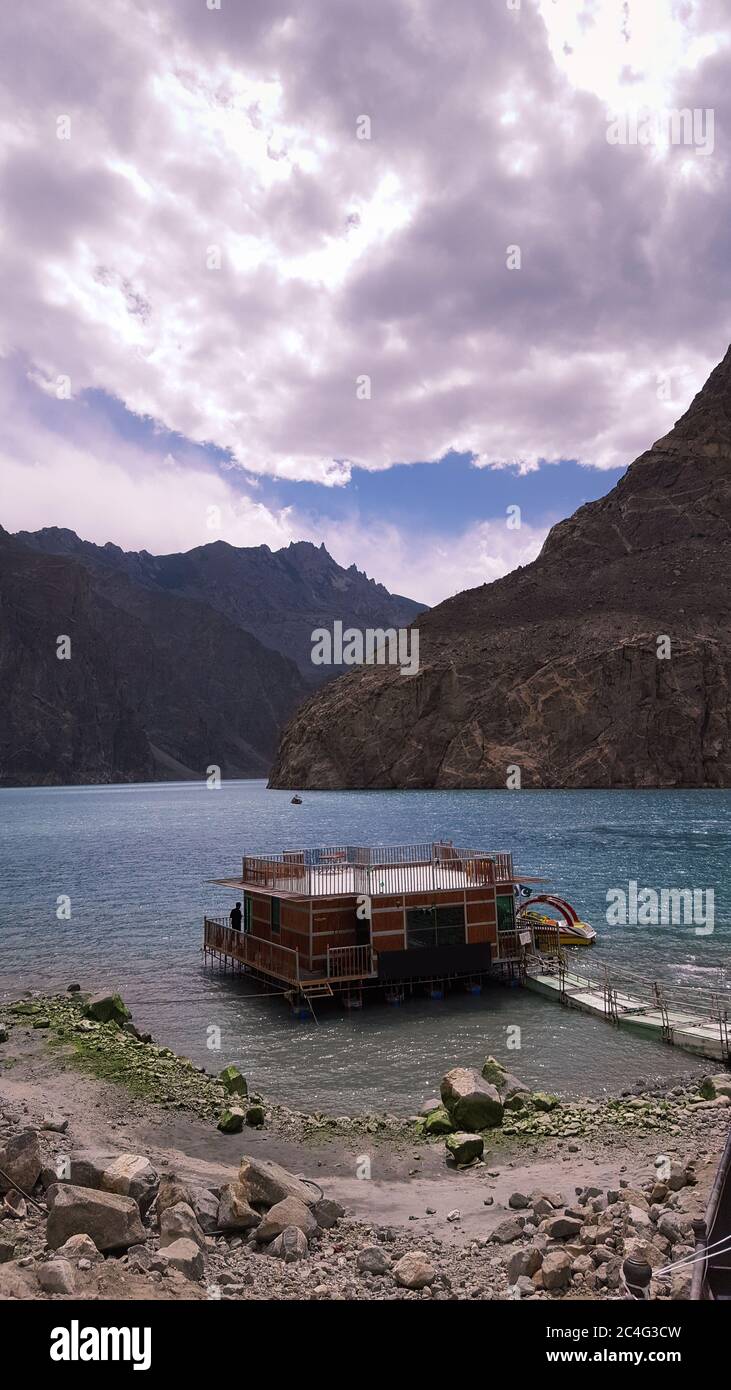 Floating Hotel at Beautiful tourist place and blue water lake, attabad lake in gilgit baltistan, Pakistan Stock Photo