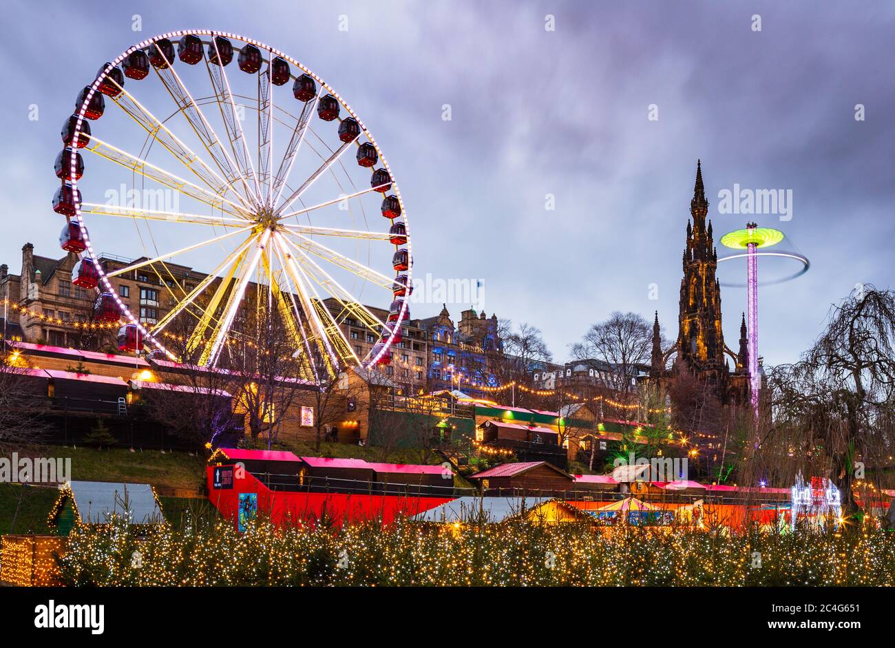 Giant Ferris Wheel and other attractions in Princes Street, Gardens on New Years Day, Edinburgh, Scotland, United Kingdom. Stock Photo