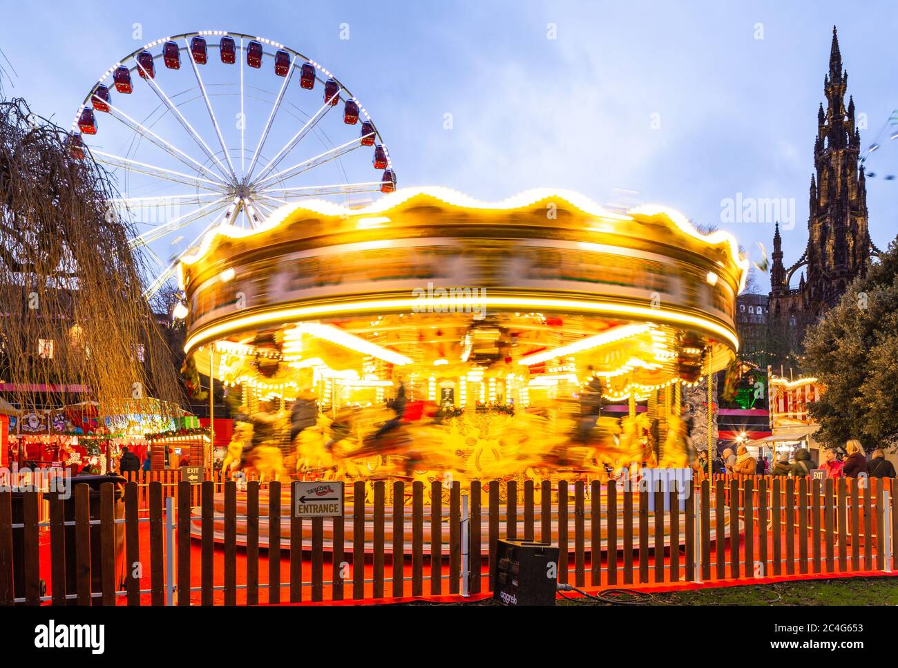 Rotating carousel (roundabout) in Princes Street, Gardens on New Years Day, Edinburgh, Scotland, United Kingdom. Stock Photo