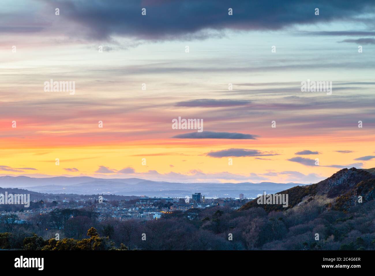 View of Western Edinburgh, immediately after sunset, from the Braid Hills. Stock Photo