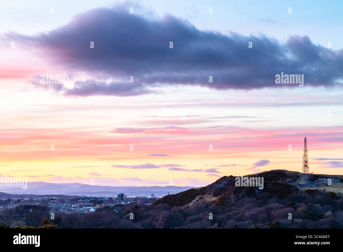 View of Western Edinburgh, immediately after sunset, from the Braid Hills. Stock Photo