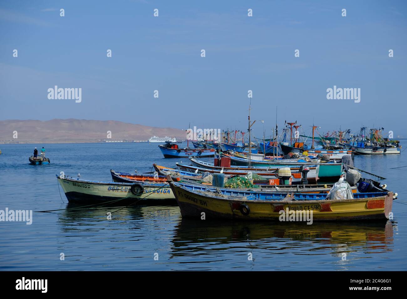 Peru Paracas - Fishing boats lie at anchor in Paracas port Stock Photo