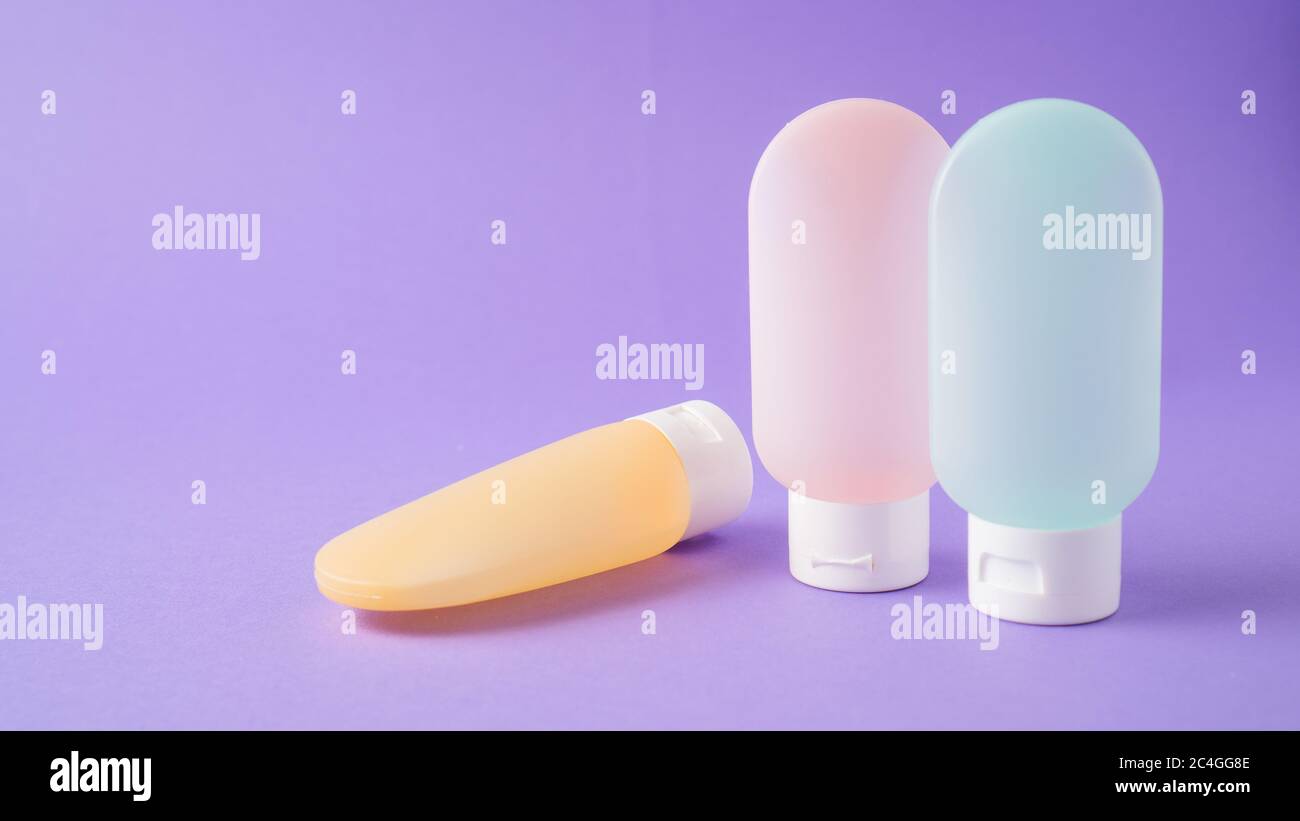 essential travel kit. toiletry kit. cosmetic bottles. small cosmetic