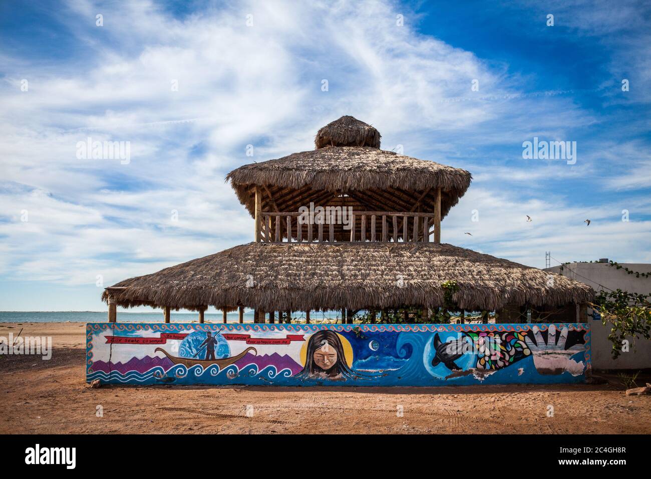 Punta Chueca, Mexico. 11th Dec, 2019. Palapa, traditional Mexican construction by the seaside of the ComcÃac indigenous community.The ComcÃac or Seri tribe, as they are known by many, are located in Punta Chueca, Sonora desert, by the northern pacific coast of Mexico. The ComcÃac indigenous community has a strong female presence within their culture. They are the principal organisers, promoters and those who are celebrated during the rituals and traditions of the community. This could not be clearer, than during one of the most important rituals of the community, the ceremony of puberty. T Stock Photo