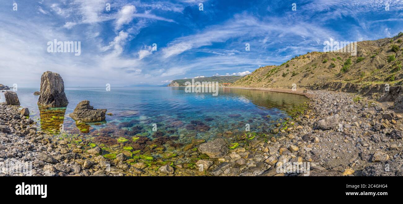 Panoramic View of Cape Ai-Fock, Veselovskaya bay and the beach of the village of Vesyoloe in the Crimea. On the foreground is the western foot of Stock Photo