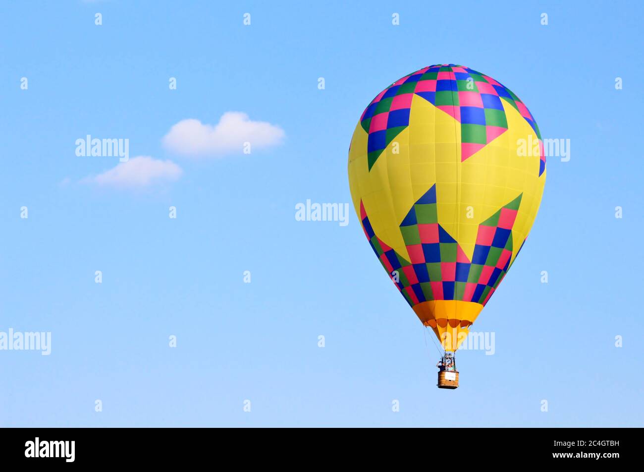 Hot air balloon in a blue sky Stock Photo - Alamy