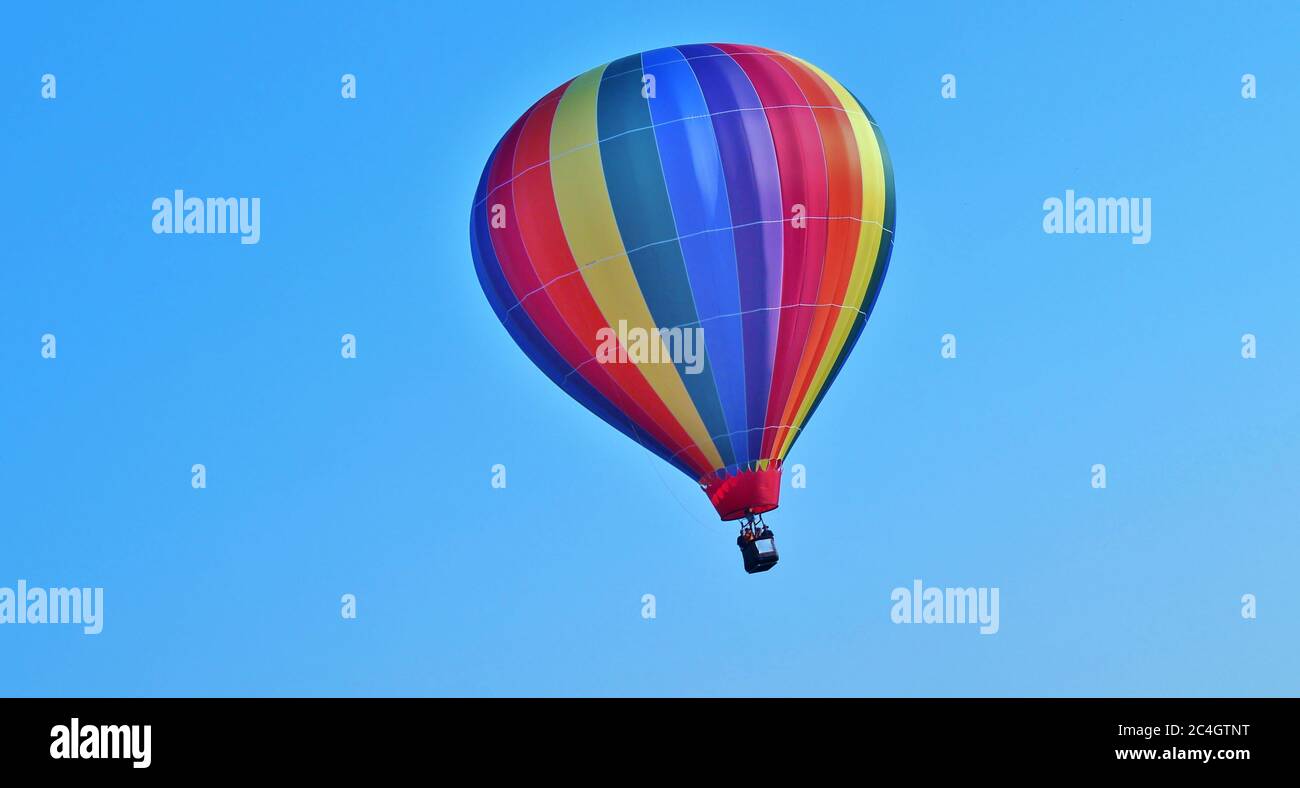 Hot air balloon in a blue sky Stock Photo - Alamy