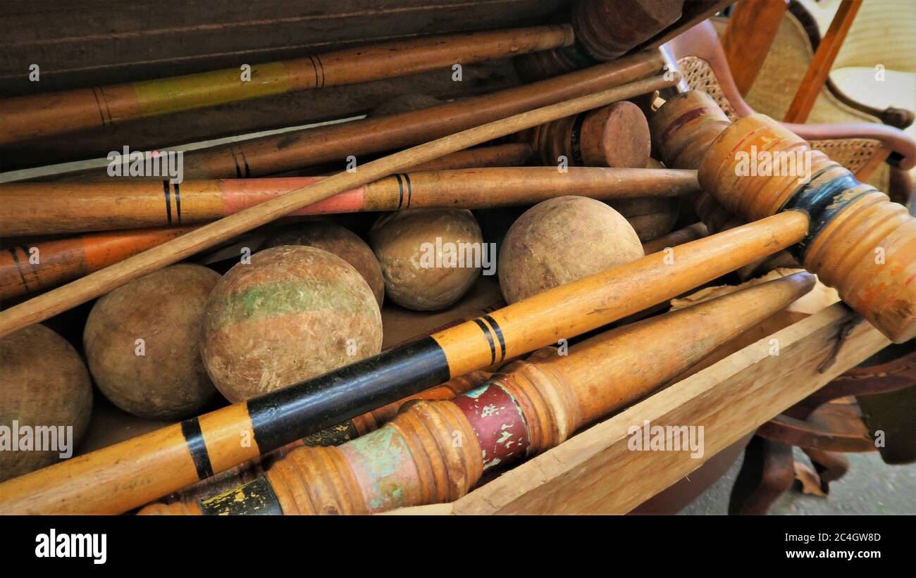 Mallet and wooden balls for playing croquet Stock Photo