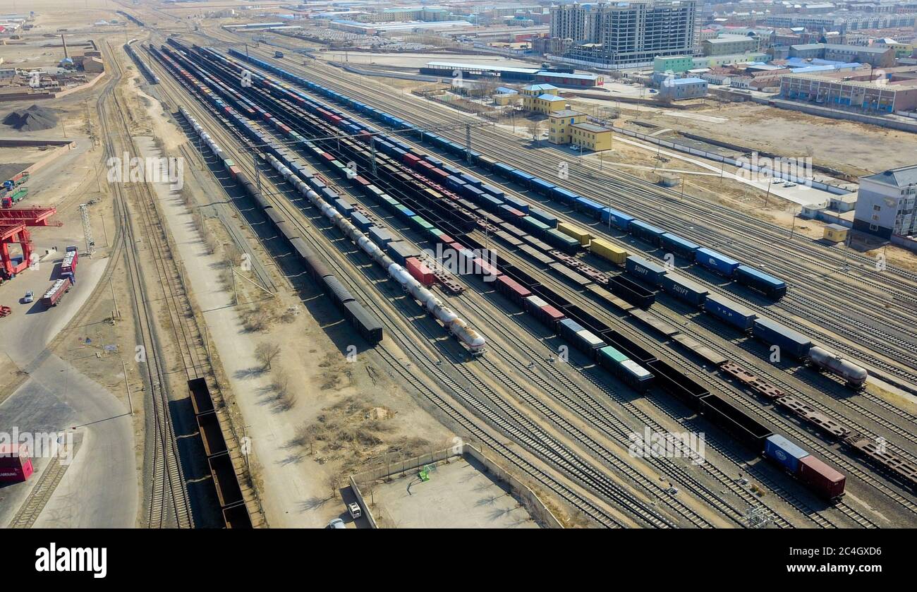 Beijing, China. 11th Apr, 2020. Aerial photo taken on April 11, 2020 shows a logistic station of the Erenhot Port in north China's Inner Mongolia Autonomous Region. The port has handled 379 China-Europe freight trains in the first quarter of this year. Credit: Lian Zhen/Xinhua/Alamy Live News Stock Photo