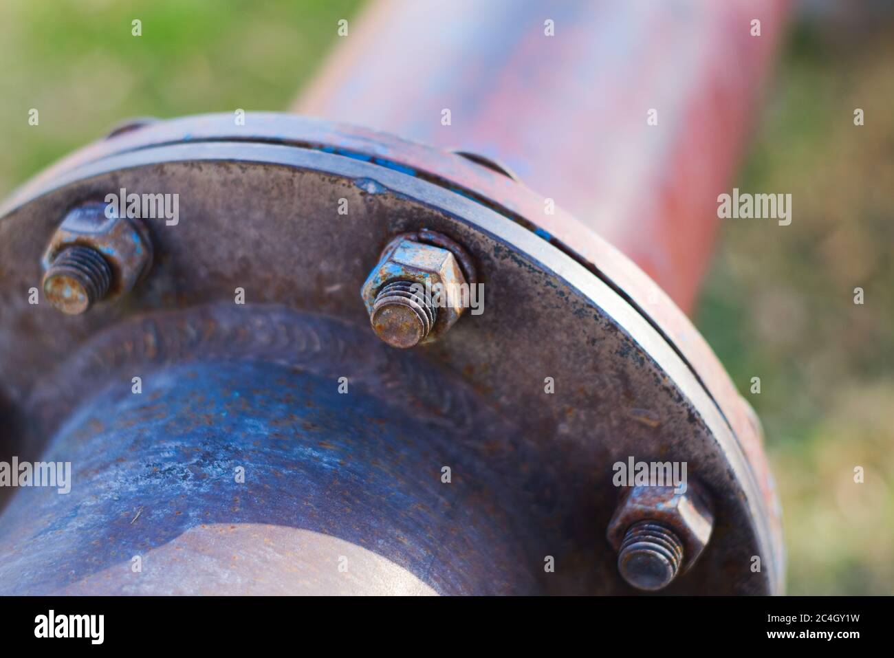 Large, weathered water pipe junction. Close up detail Stock Photo Alamy
