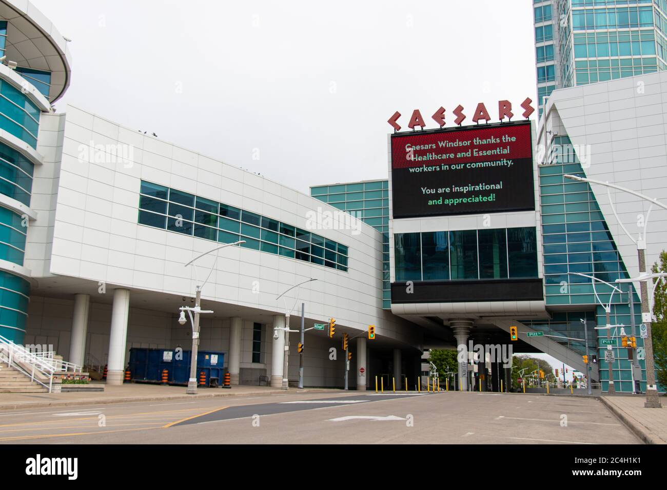 Caesars Hotel and Casino seen closed, empty for the COVID-19 pandemic, sign thanking front-line workers posted above road. Stock Photo