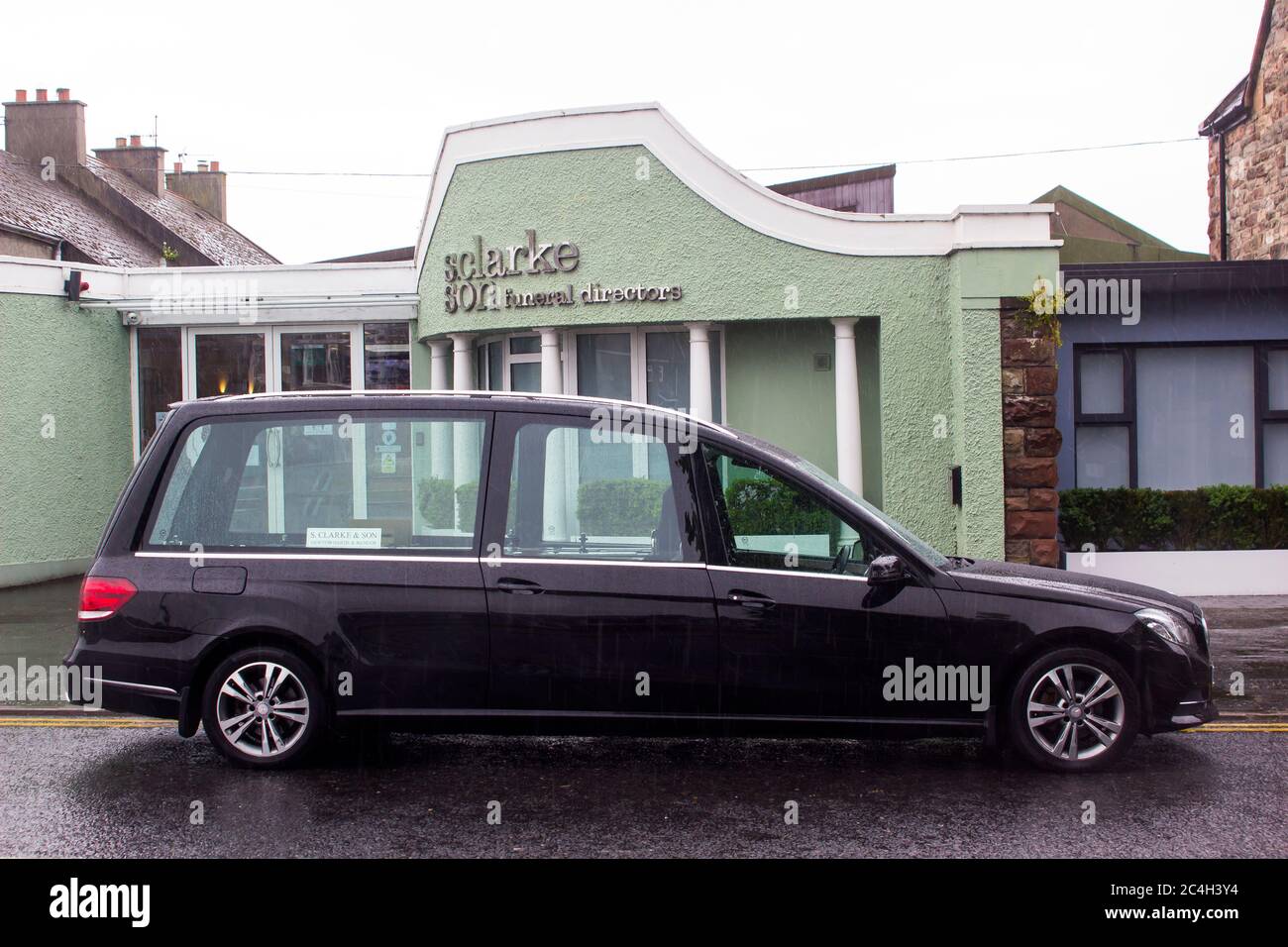 12 June 2020 Northern Ireland. A luxury Mercedes Hearse parked outside Clarke's Funeral Home in Court Square, Newtownards at the start of a busy day Stock Photo
