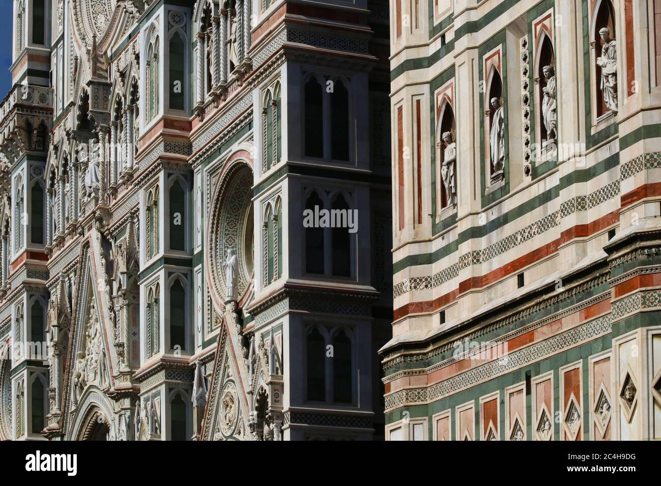 Santa Maria in Fiore cathedral of Florence, details of the decorative surface with colored marbles, touristic attraction Stock Photo