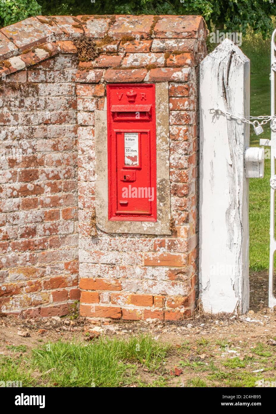 Postbox in brick wall in rural Norfolk Stock Photo