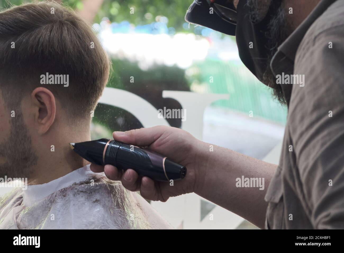 Man cuts hair clipper cutting hi-res stock photography and images - Alamy