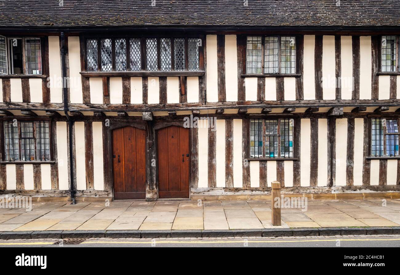 15th century almshouses in Church Street, Stratford-upon-Avon, still in use today.  Stratford-upon-Avon, England, UK. Stock Photo