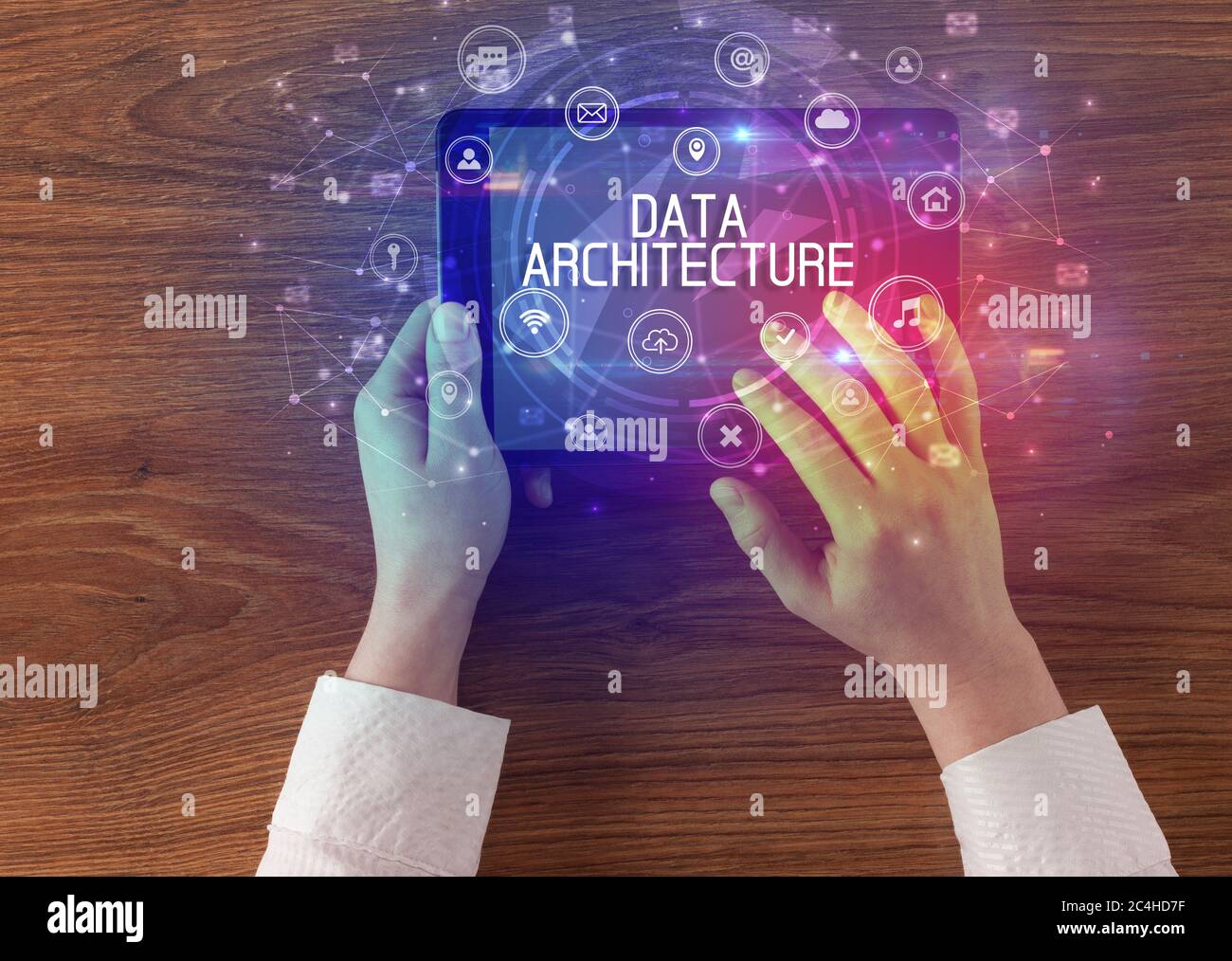 Closeup of a tablet with DATA ARCHITECTURE inscription, innovative