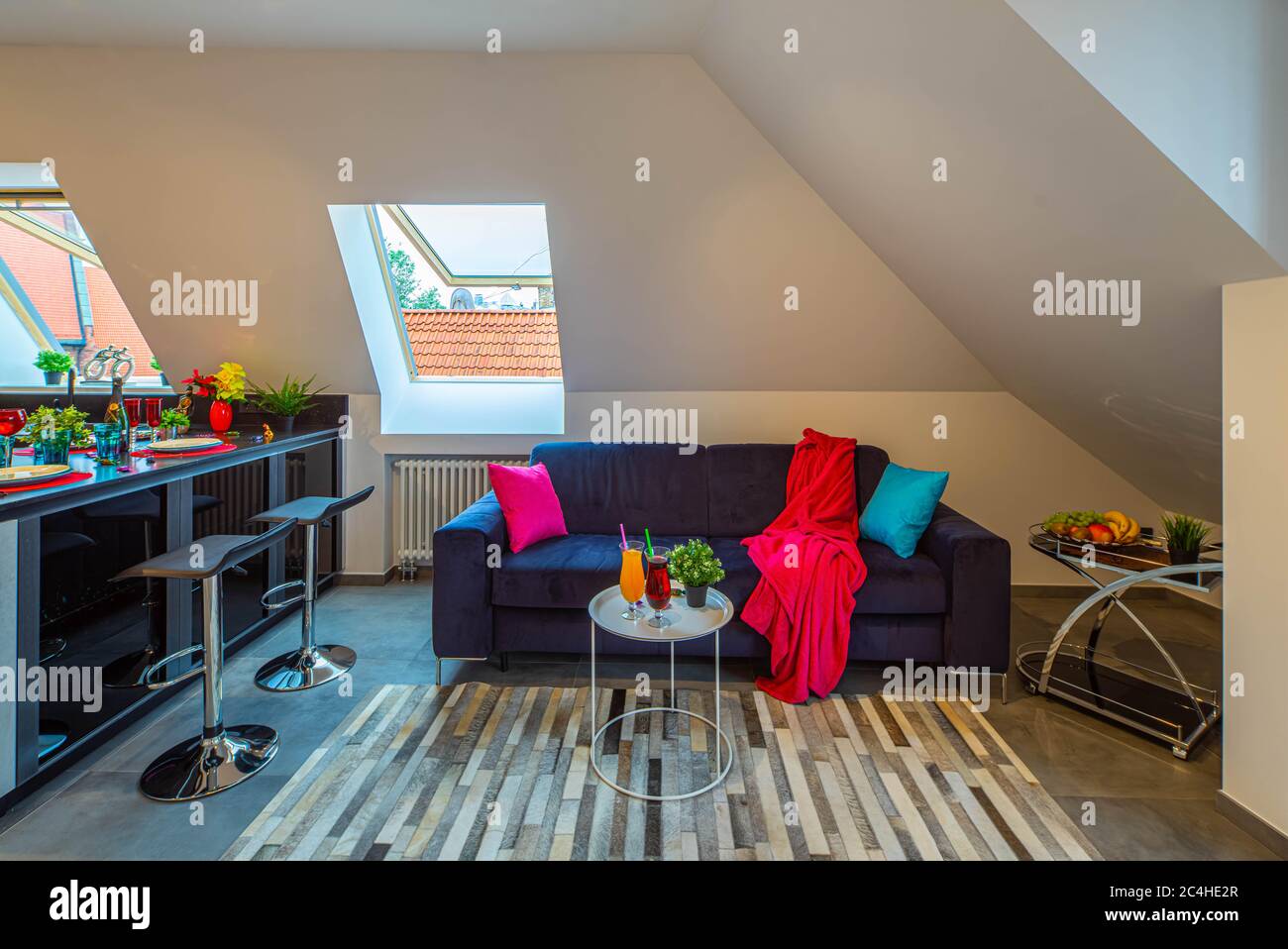 Image showcasing Modern loft interior of luxury studio apartment. Sloping ceiling with ...
