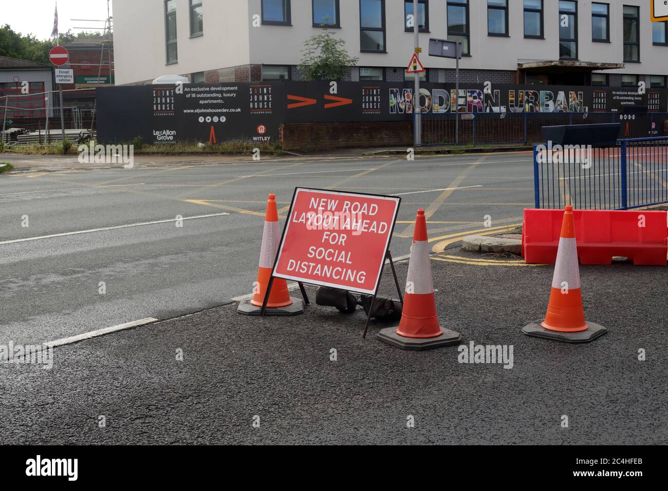 New social distancing road layout sign in Stourbridge, West midlands, England, UK. Stock Photo