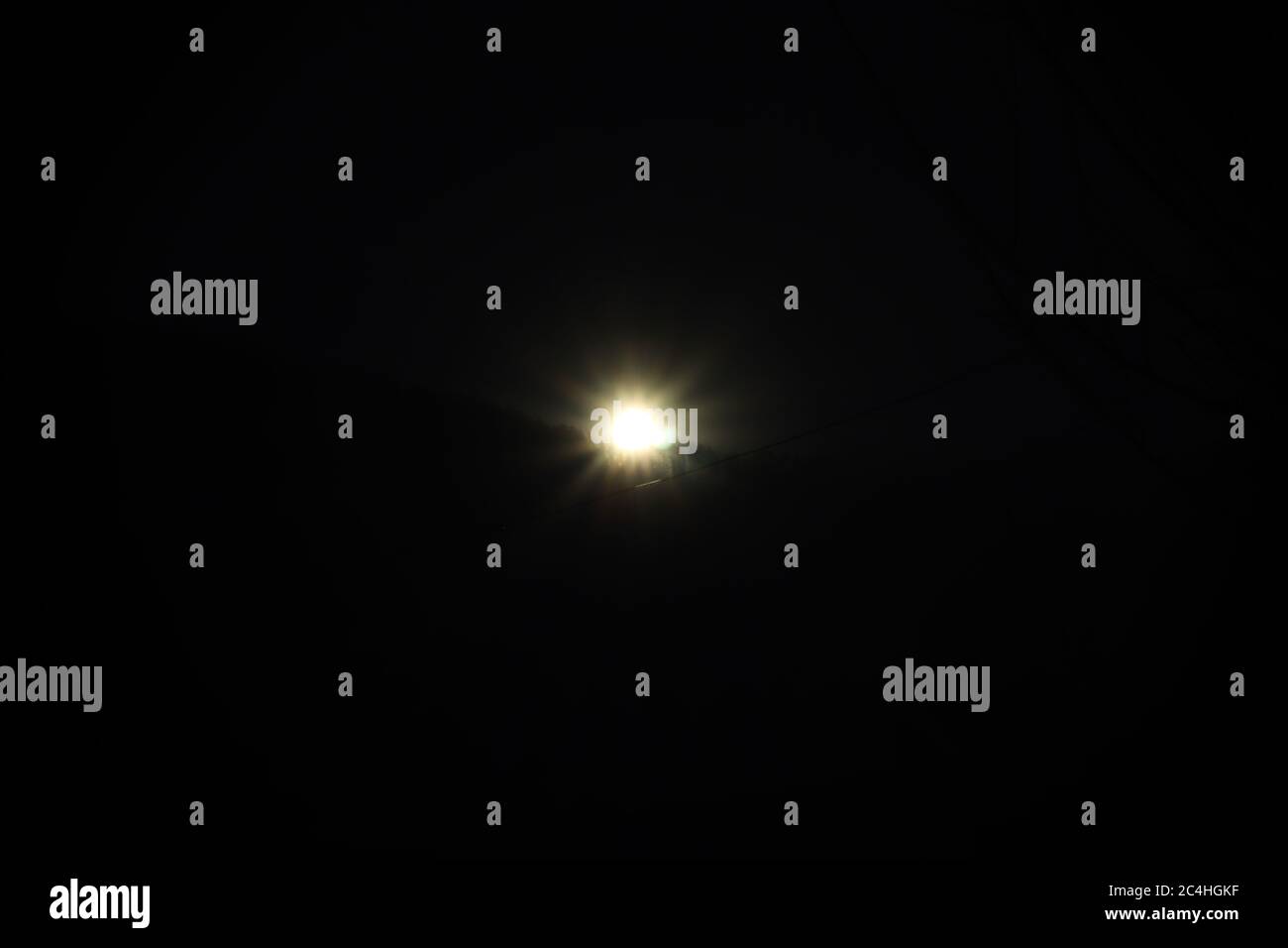Lens Flare ,Sun Flare on black background object design focus on infinity. Stock Photo