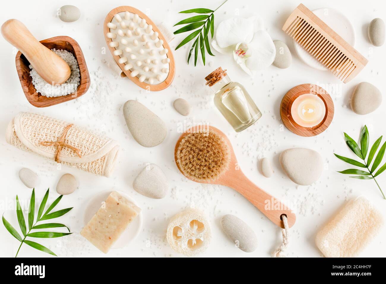 Blue shampoo bottle with combs, slices of citrus fruits, ice cubes and  exotic leaves on a yellow background with copy space. Hair care cosmetics  with Stock Photo - Alamy