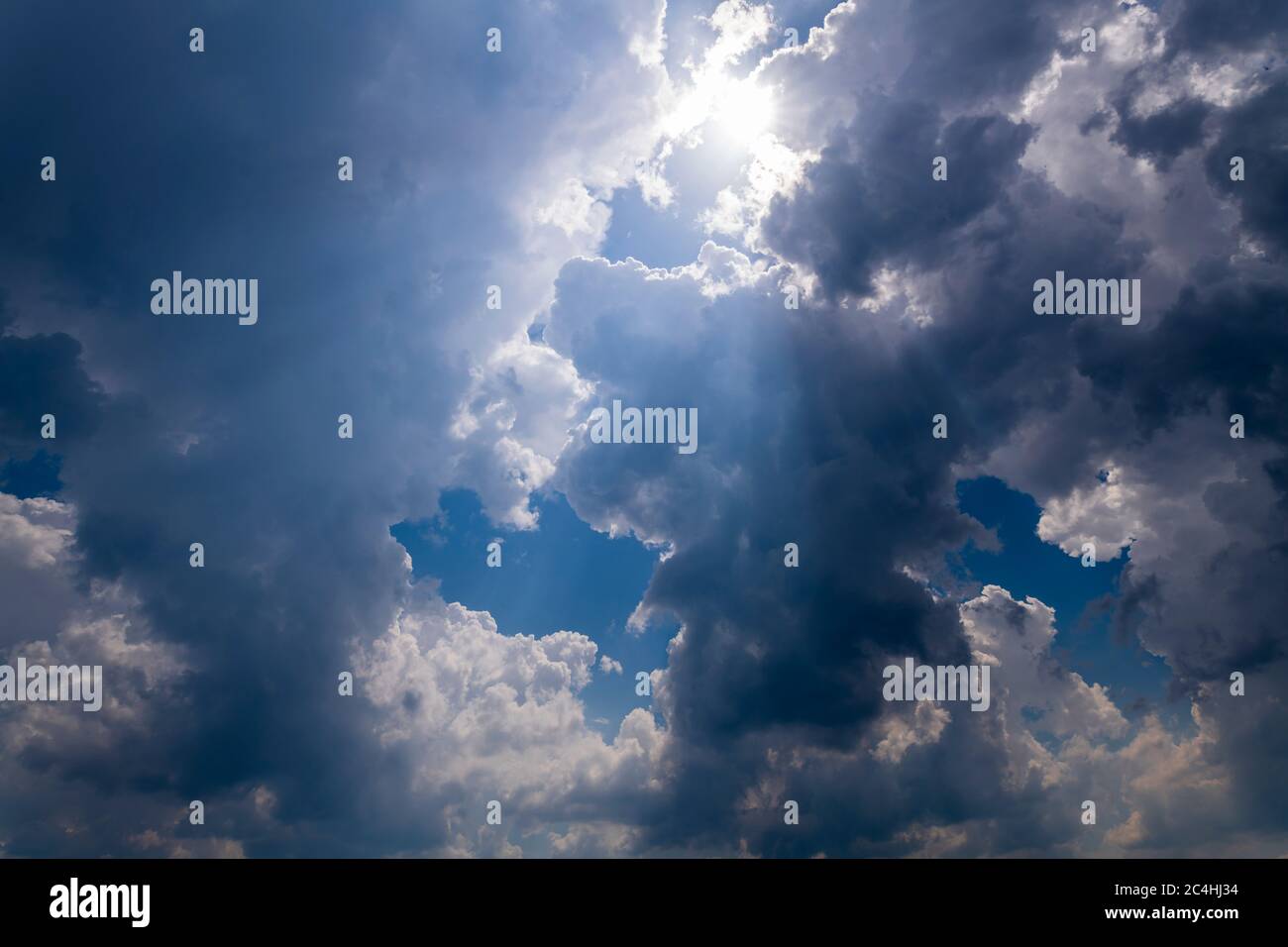 Thunderclouds contract and a storm front develops Stock Photo