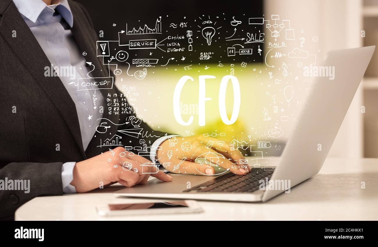 hand working on new modern computer with CFO abbreviation, modern ...
